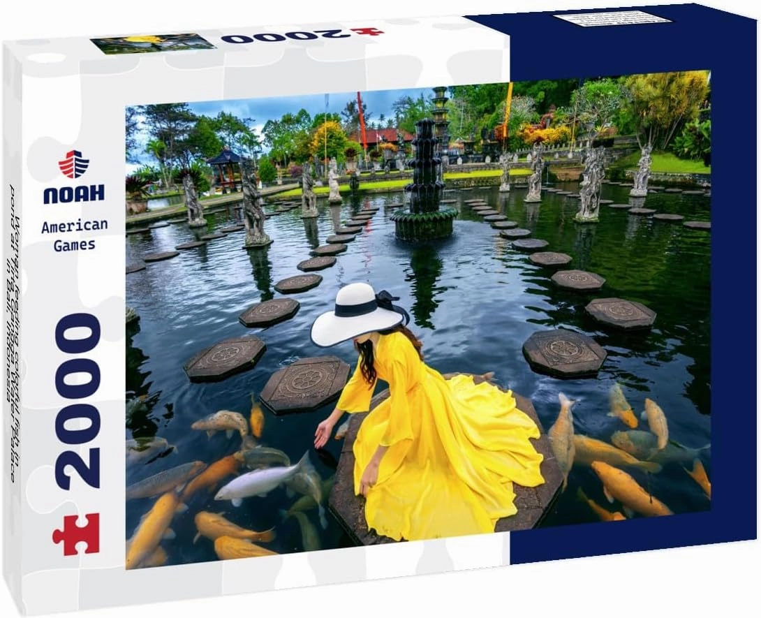 Noah Jigsaw Puzzle Woman Feeding Colorful Fish in Pond at Tirta Gangga Water Palace in Bali, Indonesia 2000 Pieces